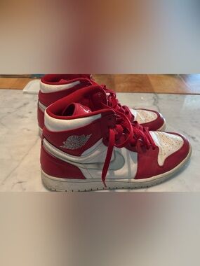 Men’s air Jordan’s size 12.  Red and white. Good condition.